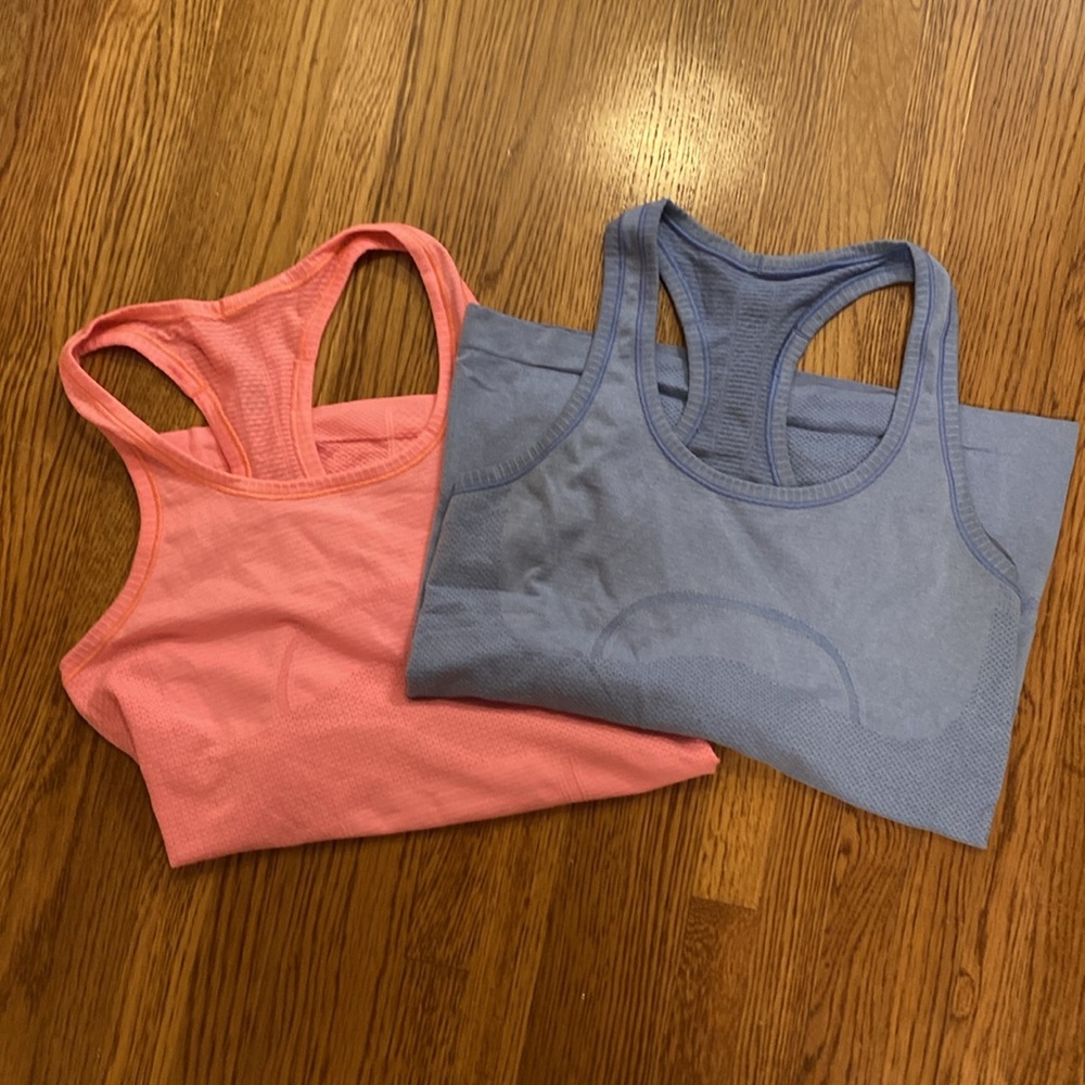 2 older lulu swiftly tech tank tops